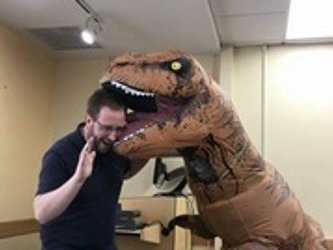 A dinosaur attacks a professor (playfully?) Image16