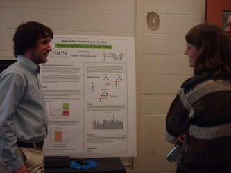 A students presents their senior thesis poster. Image02